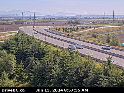 Traffic Cam Hwy-17 (South Fraser Perimeter Rd) at Deltaport Way in South Delta, looking east. (elevation: 6 metres)