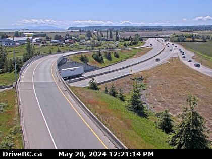 Traffic Cam Hwy-17 (South Fraser Perimeter Rd) at Deltaport Way in South Delta, looking south. (elevation: 6 metres)